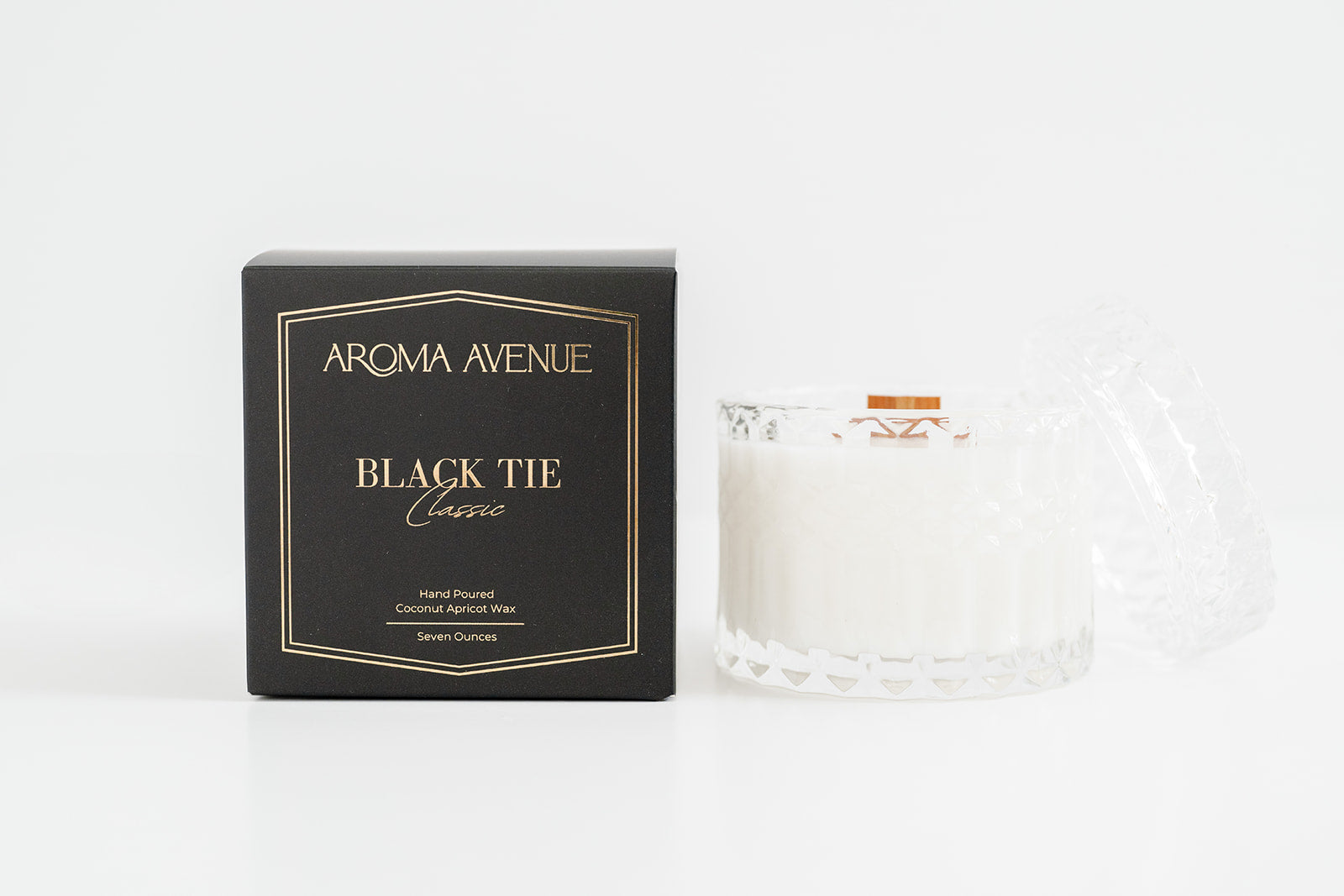 Aroma Avenue Black Tie candle packaging on a white background