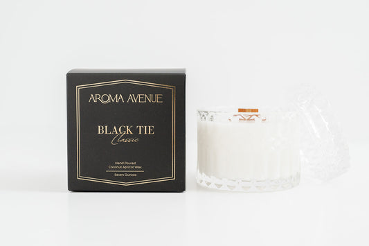 Aroma Avenue Black Tie candle packaging on a white background